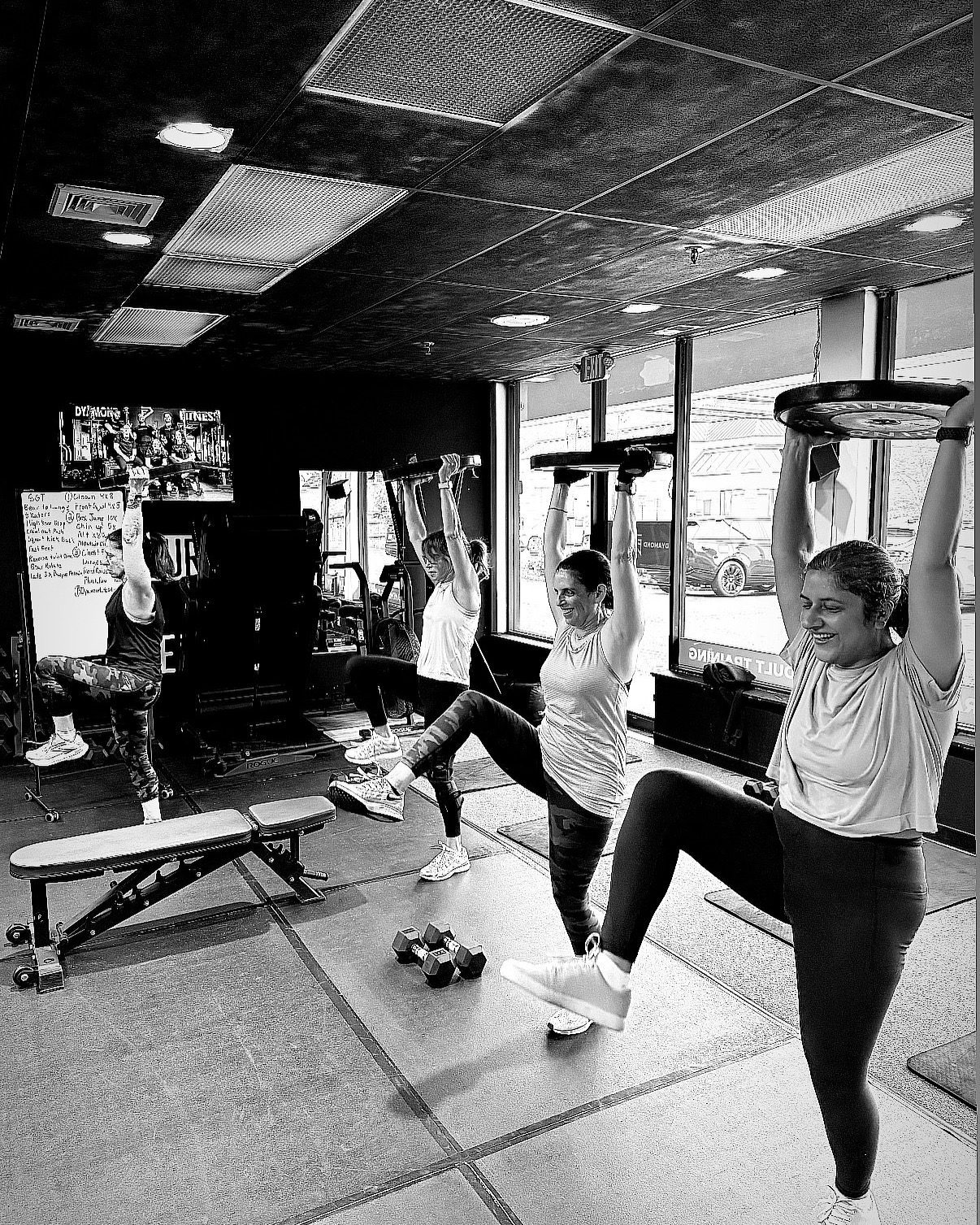 Dyamond Fitness small group class training together during a coached session